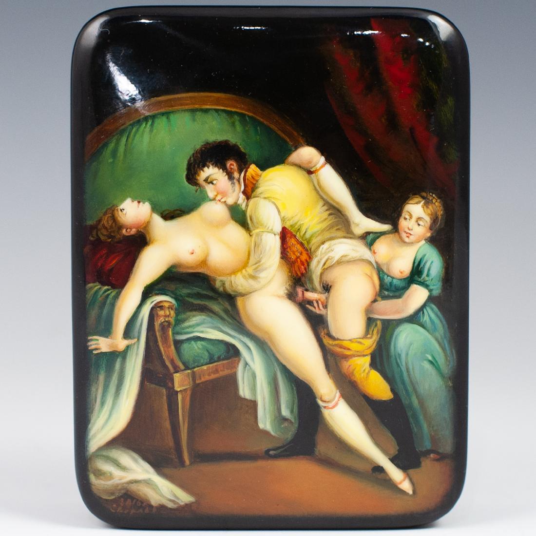 Russian Erotic Lacquered Box: DESCRIPTION: Russian Erotic Lacquered papier mache Box. This box has a rectangular shape. Features an erotic scene on the top lid. Opens revealing a burgundy interior. CIRCA: 21st ORIGIN: Russia DIMEN