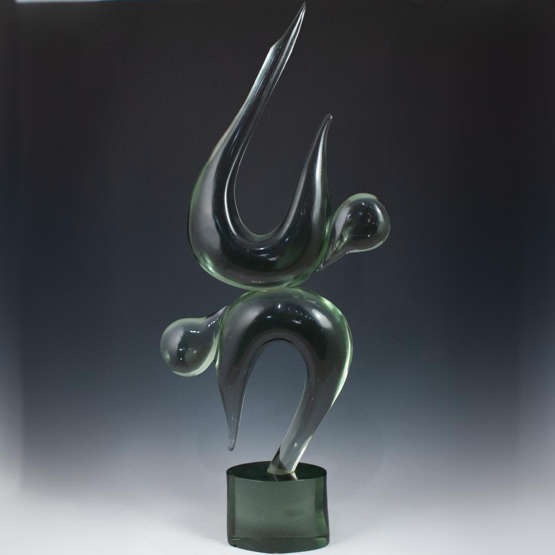 Loredano Rosin (1936-1992 Italian): DESCRIPTION: Large Loredano Rosin clear glass sculpture depicting two acrobat dancers. Inscribed " Loredano Rosin" CIRCA: 20th ORIGIN: Itali DIMENSIONS: H:38.5" CONDITION: Great condition. See lot des
