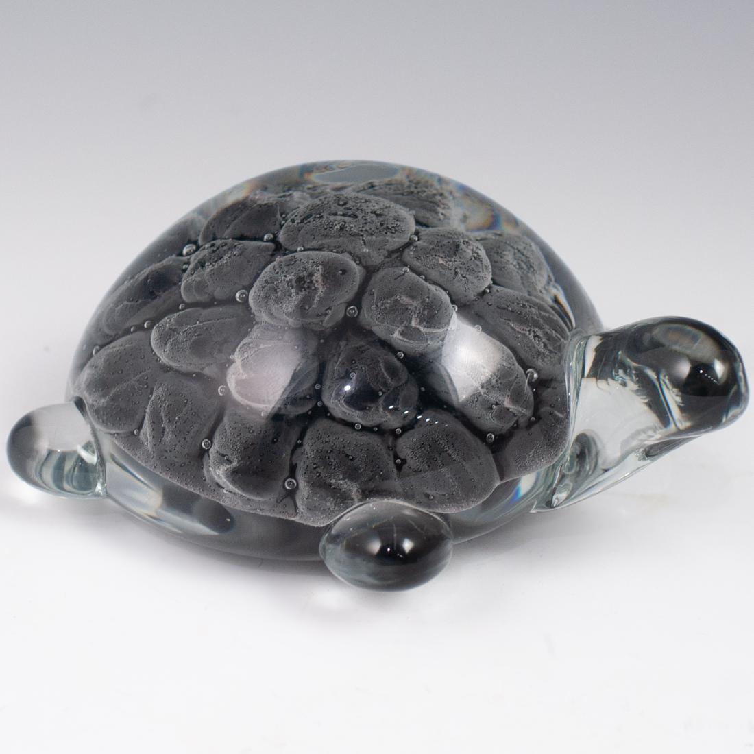 FM Ronnedy Sweden Glass Turtle: DESCRIPTION: FM Ronnedy Sweden Glass Turtle. Features a round turtle design with dark grey glass shell. Signed on the bottom" FM Ronnedy Sweden M77.170" CIRCA: 20th ORIGIN: Sweden DIMENSIONS:H:6" W:5"