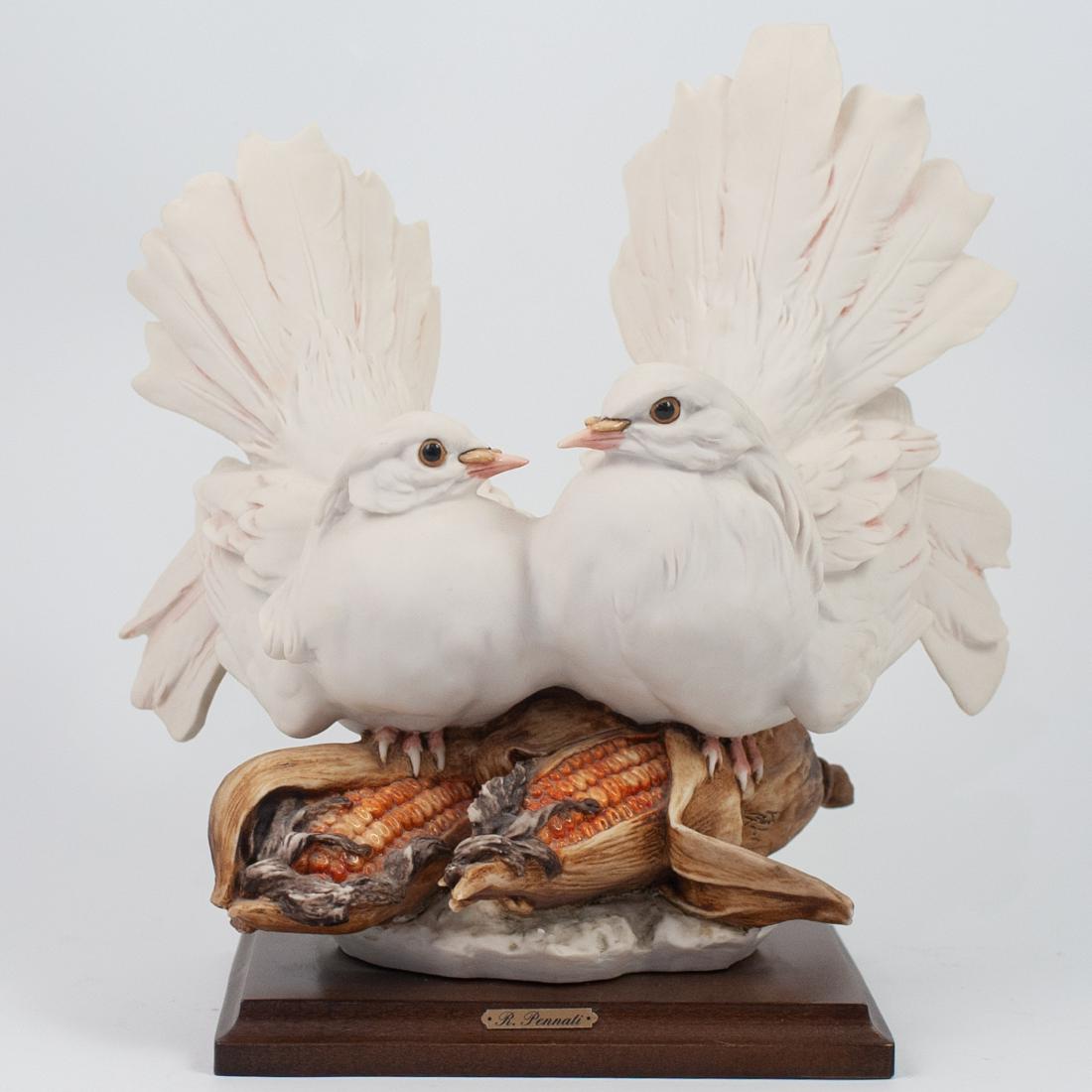 Capodimonte Porcelain Doves: DESCRIPTION: A Capodimonte Figural sculpture by artist R.Pennati features two doves in a ultra realistic rendition, completed in a bisque finish, sitting atop two corn motifs, marked along the back wi