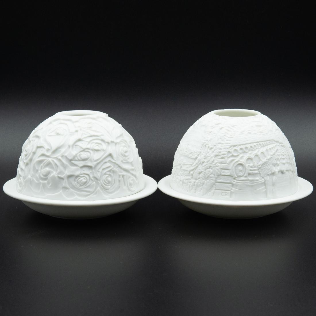 Bernardaud Limoges Porcelain Votive Candle Holders: DESCRIPTION: A pair of Bernardaud Limoges porcelain Votive candle holders with domed covers embellished with floral motifs and landscape scenes. Marked:"Bernardaud Limoges". CIRCA: Late 20th Ct. ORIGI