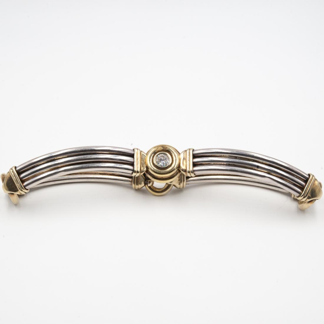 Two Tone Sterling Silver Choker Necklace: DESCRIPTION: A two tone sterling silver necklace features four strands connected by loops in gold tones, centered by a cubic zirconian and marked along the clasp ".925". Total Weight: 97 Grams CIRCA: 
