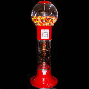 Magic Diskman Gumball Machine: DESCRIPTION: A Large Magic Diskman Spiral Gumball Machine. Features 25 cent coin mechanism with spiral dispenser executed in glass and red plastic. Gumballs are included. In working condition.CIRCA: