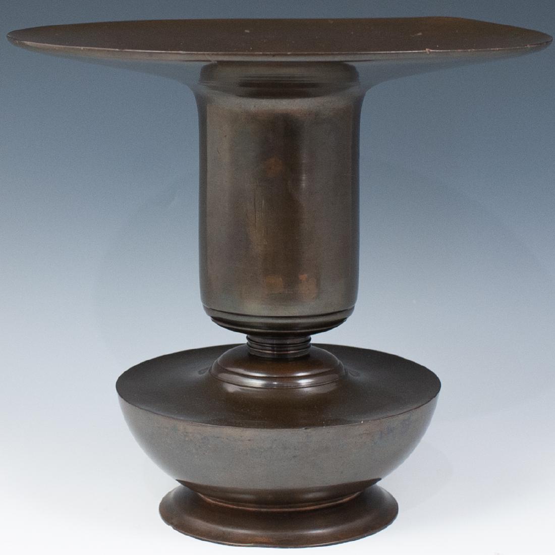 Japanese Meji Period Bronze Vase: DESCRIPTION: A Japanese Meiji Patinated Bronze Vase. Features ia wide trumpet mouth, in a warm brown patina. CIRCA: Late 19th / Early 20th Century ORIGIN: Japan DIMENSIONS: H. 12.25" x W. 13.25" CONDI