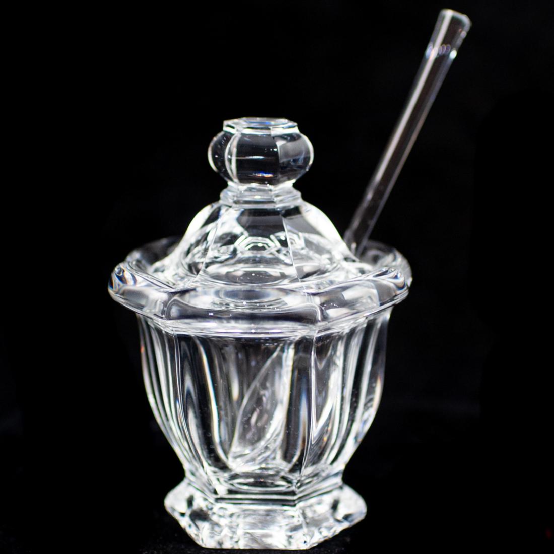 Baccarat 'Missouri' Mustard Jar: DESCRIPTION: A Baccarat 'Missouri' mustard jar with spoon. Features hexagonal baluster form, the lid with faceted knop over domed panels terminating in a circular flange cut with a spoon notch, the ba