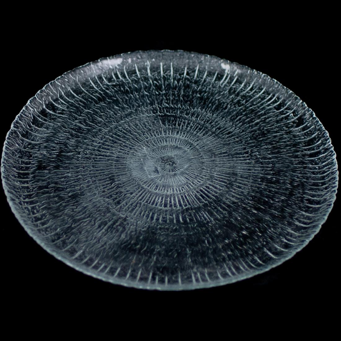 Tapio Wirkkala Plate: DESCRIPTION: A Tapio Wirkkala glass plate. In the Solaris pattern. CIRCA: 20th Century ORIGIN: Finland DIMENSIONS: D. 11.75" CONDITION: Great condition. See lot description for details on item conditi
