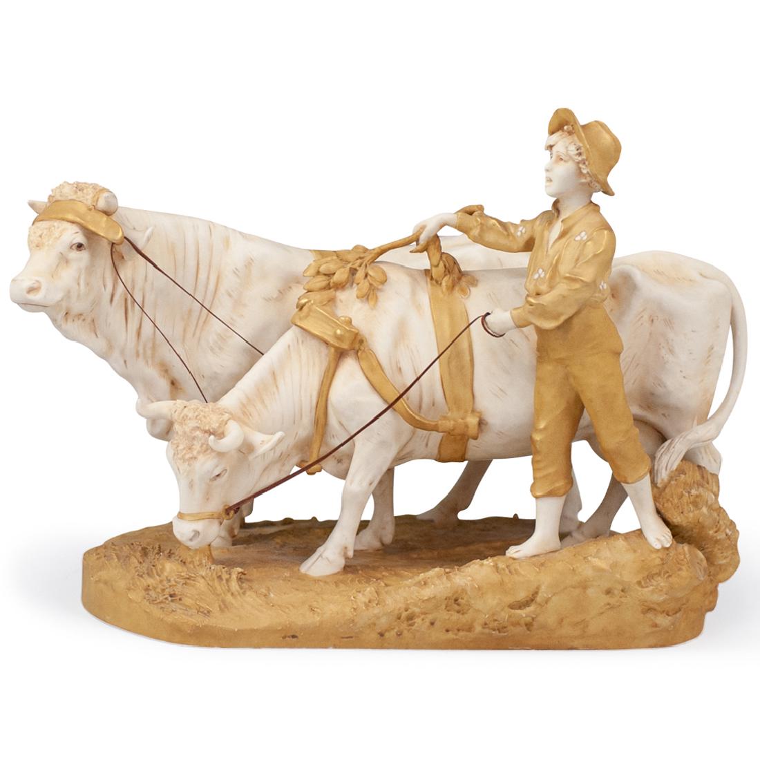 Royal Dux Boy Herding Cows Figurine: DESCRIPTION: A 'Royal Dux' hand-painted porcelain figurine. Features young boy herding two cows with leather ropes. Marked on the underside with raised pink clay triangle "Royal Dux Bohemia" 837' CIRC