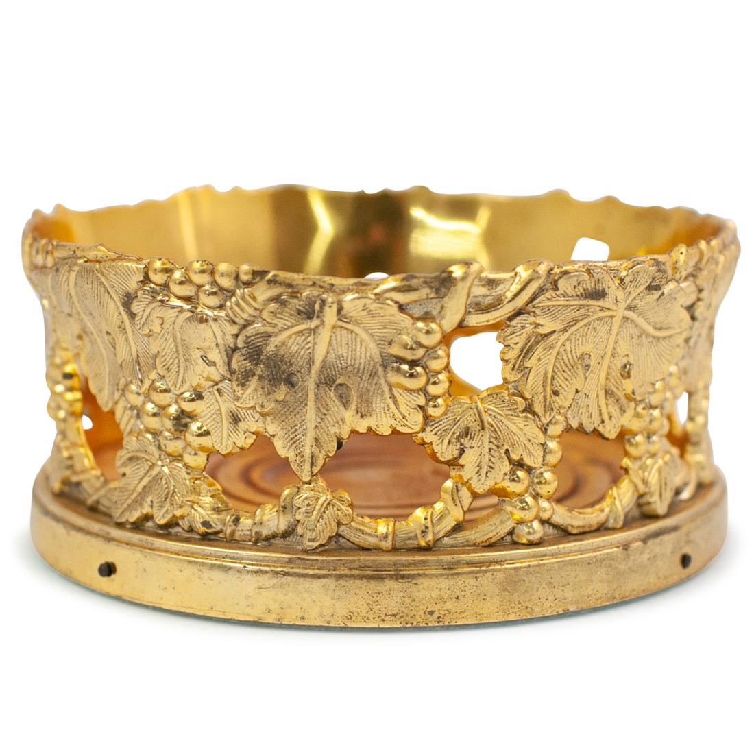 Gilt Bronze Wine Bottle Coaster: DESCRIPTION: A gilt bronze wine bottle coaster. Features grape and vine pattern throughout. CIRCA: 20th Century ORIGIN: DIMENSIONS: L. 5.5" CONDITION: Great condition. See lot description for details