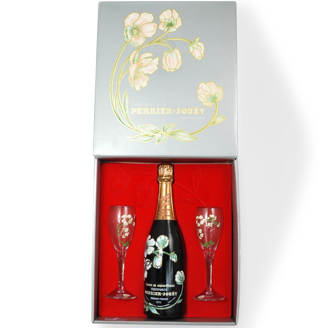 Perrier-Jouet Fleur de Champagne Bottle in Box: DESCRIPTION: A vintage 1975 Perrier-Jouet Fleur de Champagne Bottle in Presentation Box. Includes two painted crystal champagne glasses. Imported by Chateau & Estate Wine Company. Bottle size 750ML. C