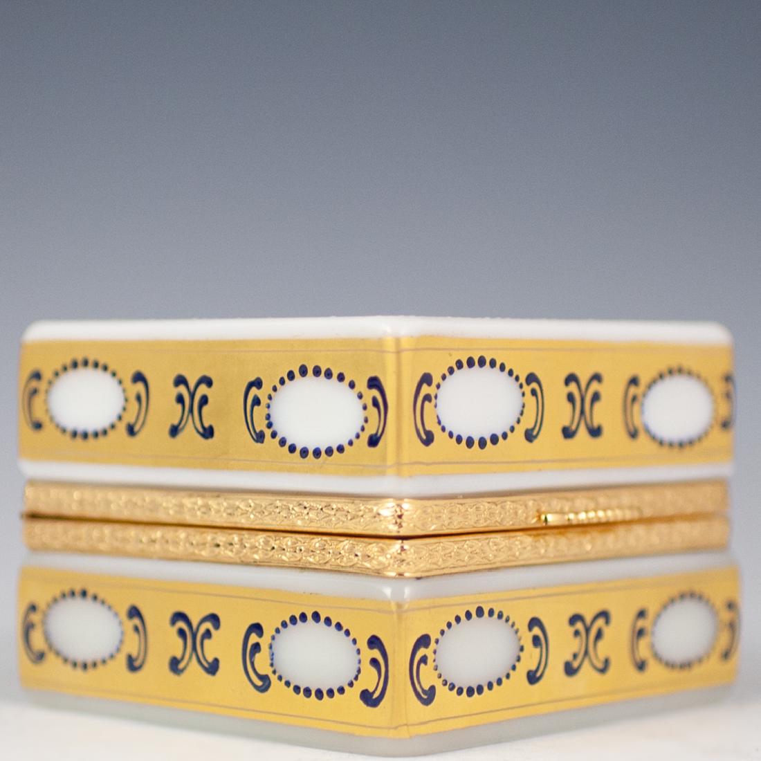 Andromeda Murano Glass Enameled Box: DESCRIPTION: An Andromeda, Murano glass box. Composed of a cubical, milky white opaline glass foundation, with 24kt gold trims, handpainted floral motifs, and enameled detailing. Signed on the undersi