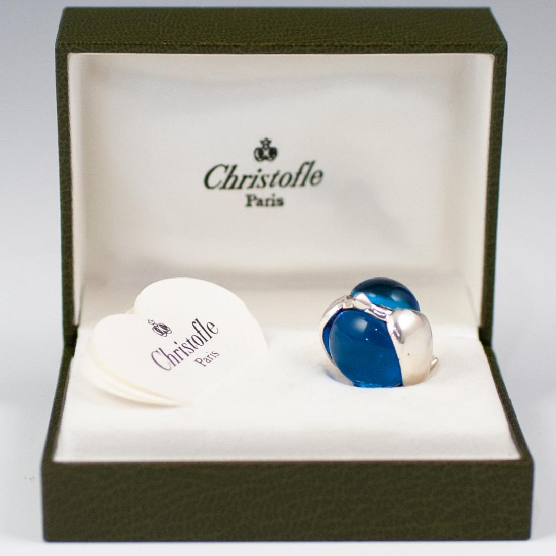 Christofle Silver & Glass Bird Figurine: DESCRIPTION: A tiny christofle figurine composed of a glass center body encompassed by silver plated beak, wings and tail, finished with a blue cabochon on the top. Marked "Christofle France" on the b