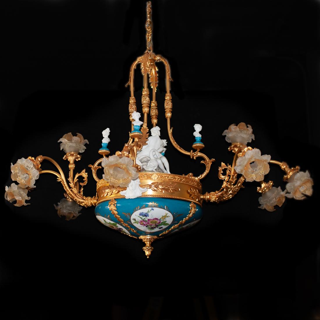 Tiche DorÃ© Bronze Sevres Style Chandelier: DESCRIPTION: An Italian Tiche chandelier composed of an overall dore bronze foundation with four rods of scrolled Rococo acanthus leaf form, encompassing the center bisque porcelain figurine of two nu