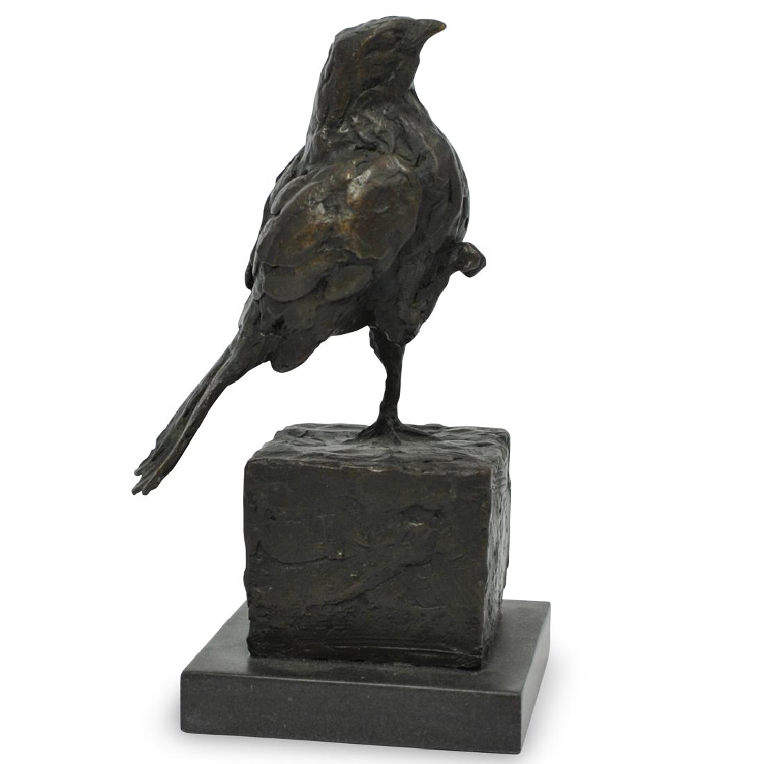 Signed Bronze Bird Sculpture: DESCRIPTION: A signed bronze bird sculpture by Milo. In a dark brown patina. Depicts a bird with his right leg perched up, resting on a shaped base. Signed 'Milo' CIRCA: 20th Century DIMENSIONS: H. 7.
