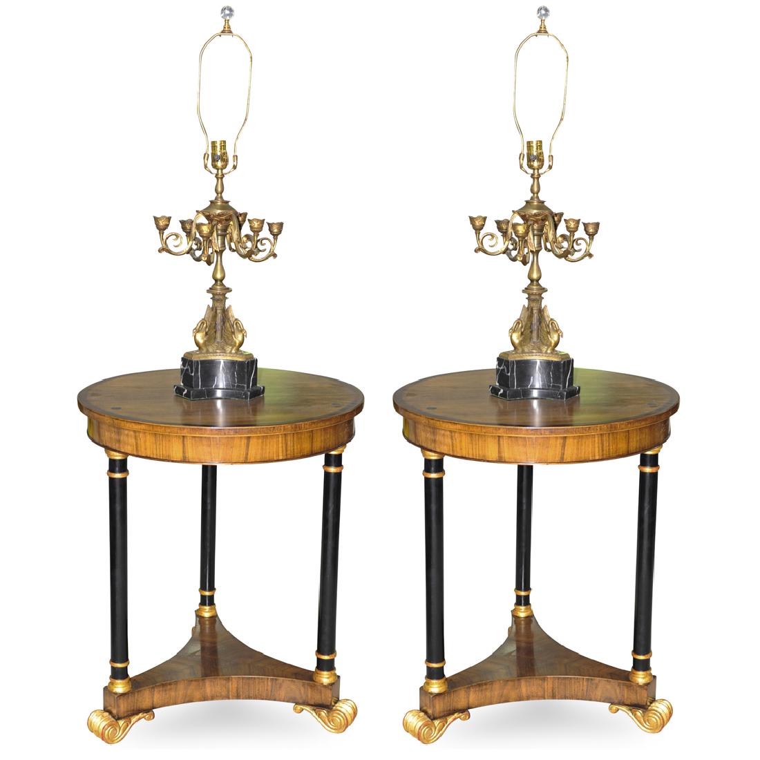 Pair of Mixed Wood and Bronze Center TablesÃ‚: DESCRIPTION: A pair of wood center tables with mounted table lamp. Features a round top over a simple recessed apron, supported by a tripod base. The three legged base is made of wood and gilded mount