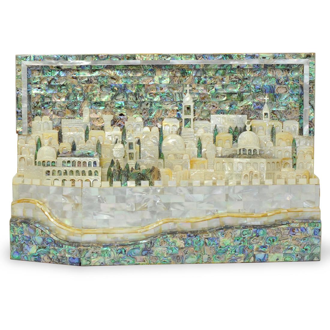 Judaica Mother of Pearl and Shell Sculpture: DESCRIPTION: A judaic mother of pearl and abalone shell sculpture depicting an Israeli city. CIRCA: 20th Century ORIGIN: Israel DIMENSIONS: H. 13" x L. 20" x W. 3.5" CONDITION: Great condition. See lo