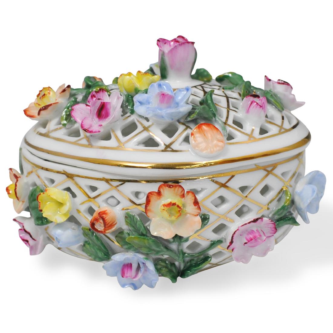 KPM Reticulated Dresser Box: DESCRIPTION: A KPM porcelain reticulated covered dresser box, features applied flowers on a white and gilt ground having reticulated top and sides. Marked 'KPM' CIRCA: 20th Century ORIGIN: Germany DIM