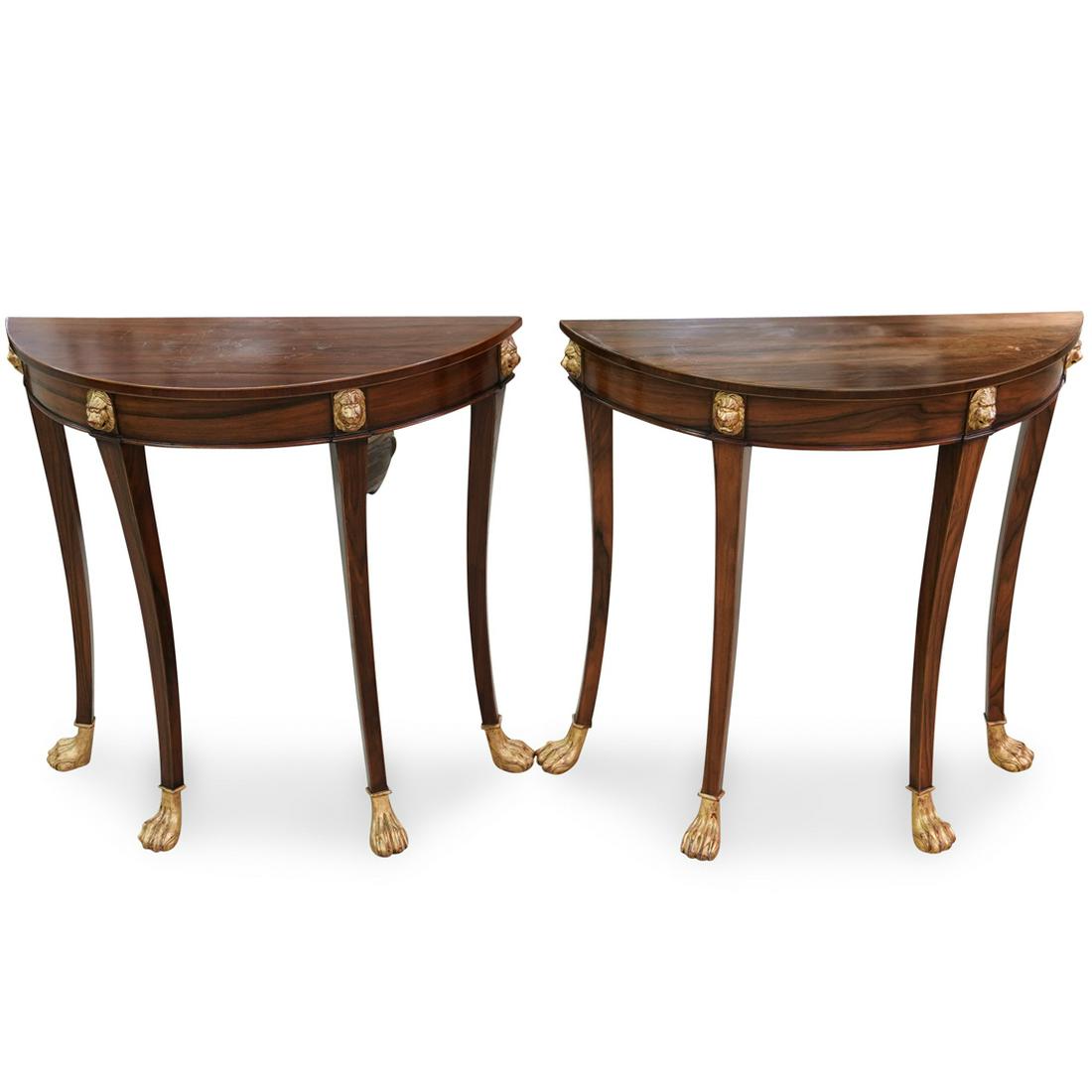 Pair of Rosewood and Giltwood Demi-Lune Tables: DESCRIPTION: A Pair of Late George III style rosewood and giltwood demi-lune tables. Featuring rosewood top and banding, gilded lion head motifs along the apron, over cabriole legs, terminating in gil