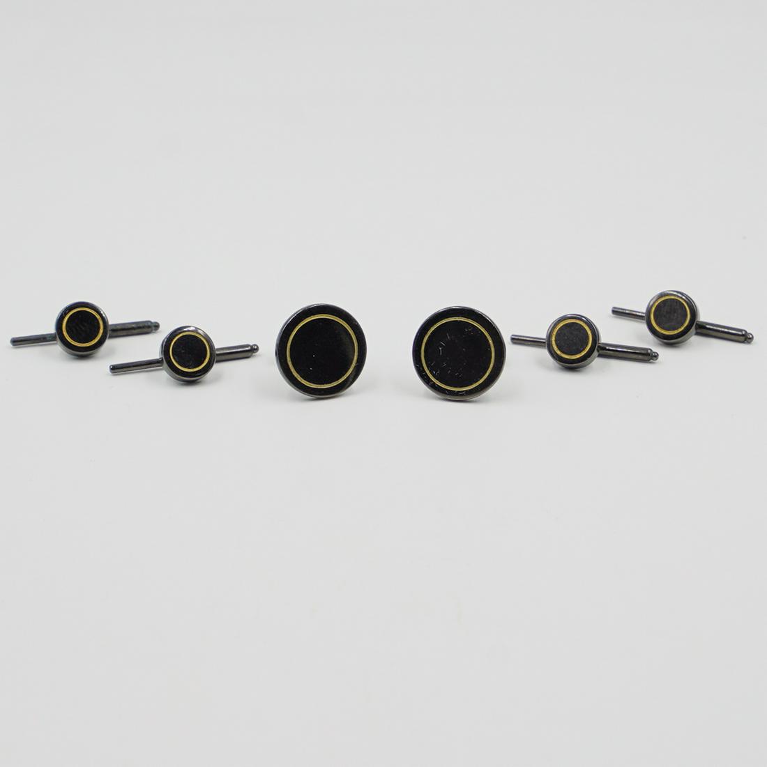 Set of Three Pierre Cardin Cufflinks: DESCRIPTION: A set of three Pierre Cardin cufflinks. Includes a set of two and a large pair of cufflinks with black onyx with circular gold band on center. Marked with Pierre Cardin logo. CIRCA: 20th 
