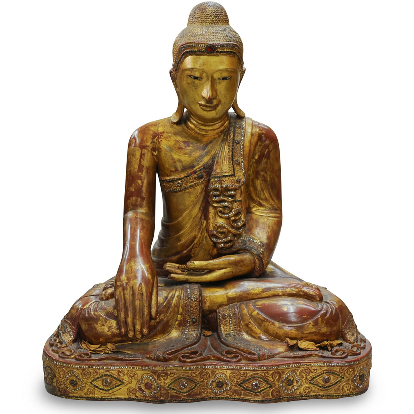 Mandalay Gilt Wood Seated Buddha: DESCRIPTION: A large giltwood and gesso buddha, depicts seated buddha with hands in Bhumisparsha mudra, with inlaid mirrored glass accents overall. CIRCA: 19th Century ORIGIN: Southeast Asia DIMENSION