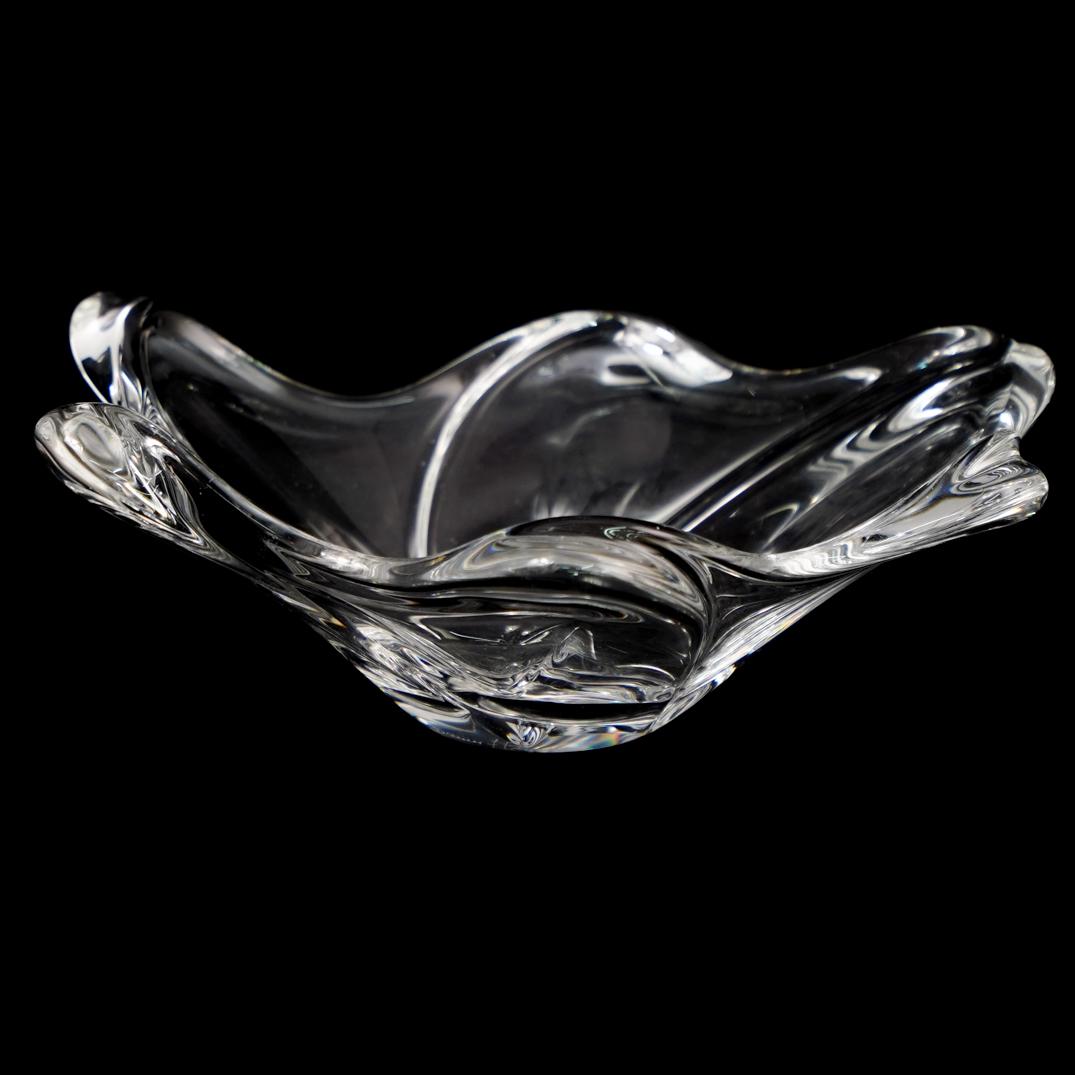Daum France Crystal Bowl: DESCRIPTION: A Daum crystal centerpiece bowl. Stamped on the side "Daum France" CIRCA: 20th Century ORIGIN: France DIMENSIONS: H. 3" x W. 8.5" CONDITION: Great condition. See lot description for detai