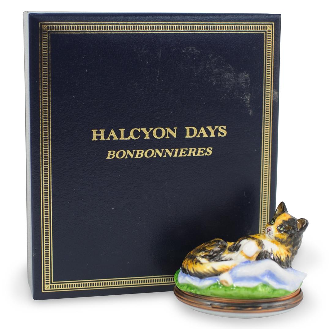 Halcyon Days Bonbonnieres Porcelain Trinket Box: DESCRIPTION: A Halcyon Days Bonbonnieres "Kitten" porcelain and enamel pill box. Includes original box and booklet. CIRCA: 20th Century ORIGIN: England DIMENSIONS: H. 1 5/8" x W. 2" CONDITION: Great c