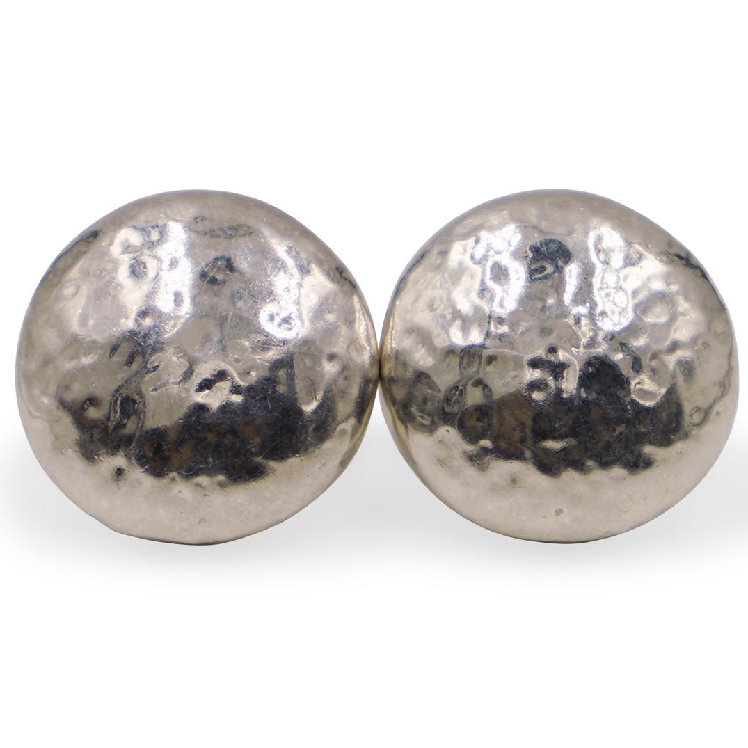 Ippolita Italian Sterling Silver Earrings: DESCRIPTION: A pair of sterling silver earrings by Italian Designer Ippolita features in a disc form with textured surface, marked along the back "Ippolita 925". With clip on closures, Total Weight: 1