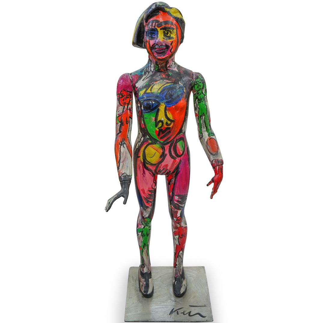 Peter Keil (German, b. 1942) Painted Sculpture: DESCRIPTION: A painted mannequin sculpture of a standing nude, executed in vibrant colors in an abstract style. Signed on base. CIRCA: 20th Century ORIGIN: Germany DIMENSIONS: H. 53" CONDITION: Good c