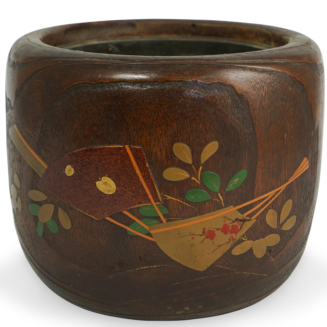 Antique Japanese Inlaid Wood Hibachi: DESCRIPTION: An antique Meiji period wood Hibachi composed of barrel forms, embellished with lacquered floral motifs, finished with inlaid mother of pearl detailing of Japanese fans. CIRCA: Early 20th