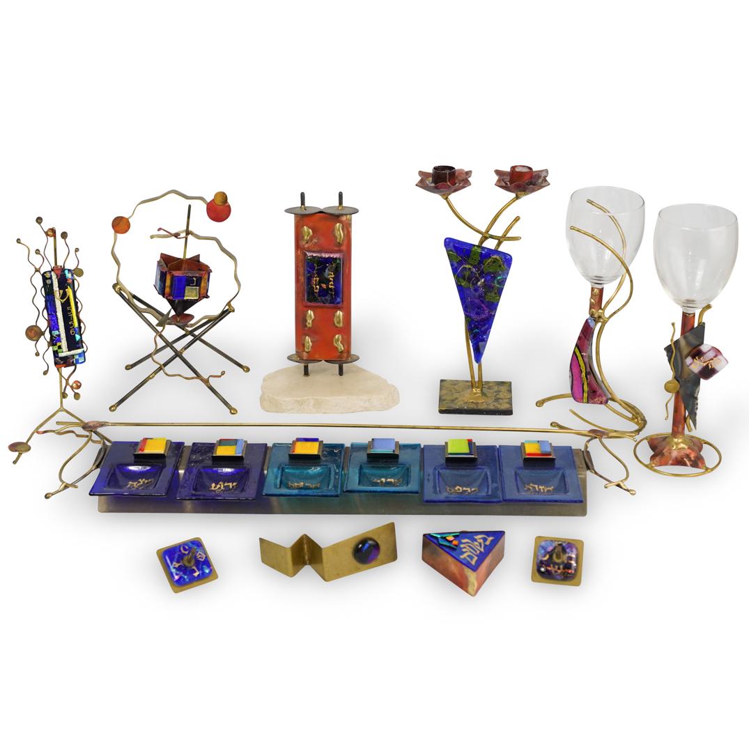 Set of 11 Gary Rosenthal Mixed Metal Sculptures: DESCRIPTION: A set of 11 Gary Rosenthal Collection Judaica mixed metal, copper and glass sculptures and tablewares. Some are signed and dated. Including two wine glasses, a mezuzah on stand, a fused g