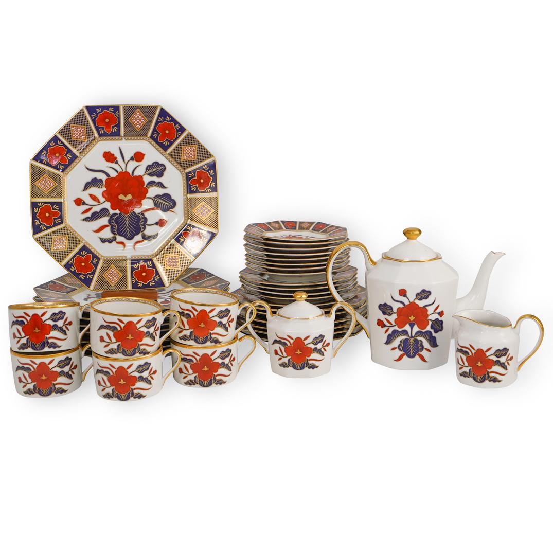 (37 Pc) Fitz and Floyd "Empress" Porcelain Dinner: DESCRIPTION: A Fitz and Floyd dinner service decorated in the "Empress" Pattern includes 5 dessert plates, 6 appetizer plates and 8 dinner plates, each plate decorated with blooming floral patterns in