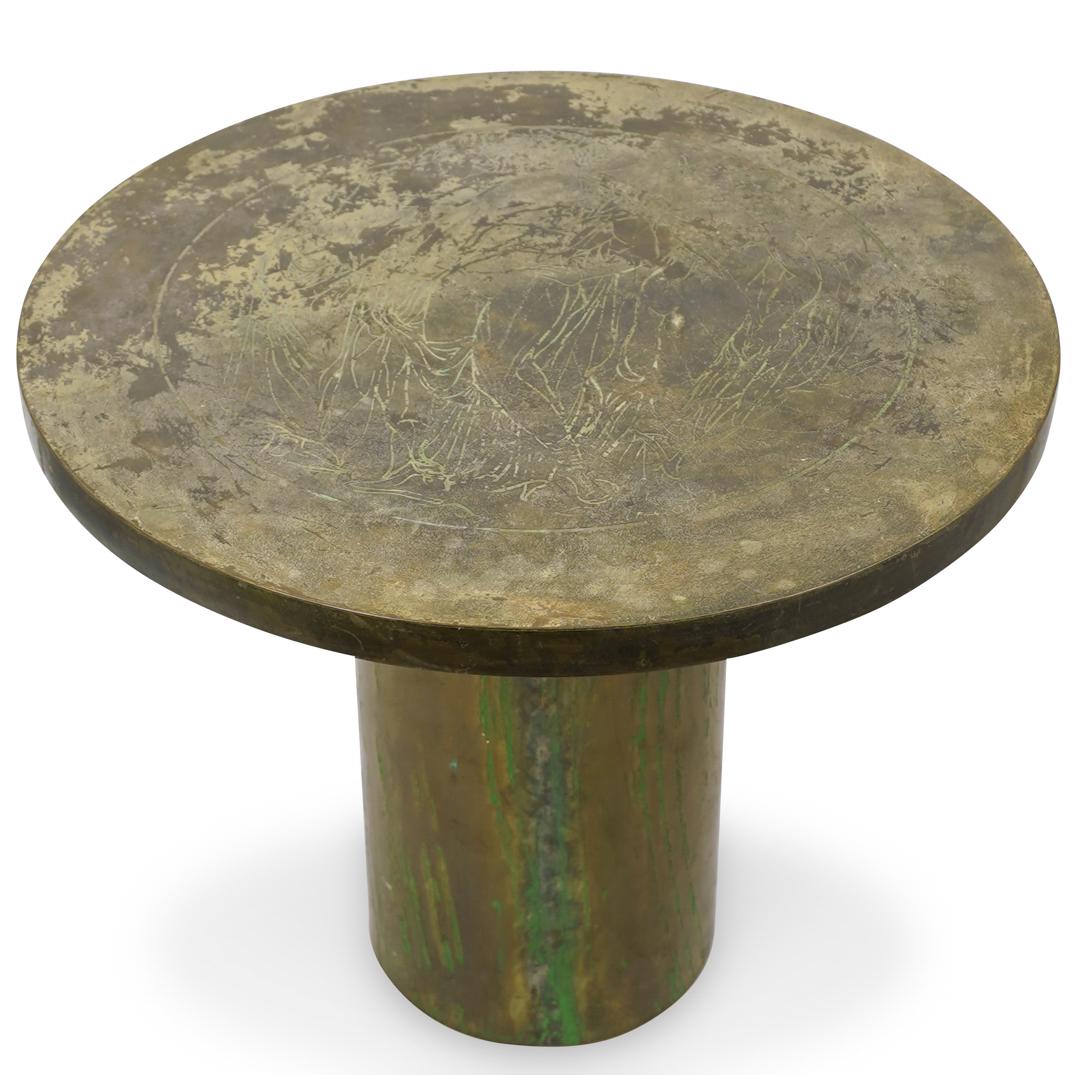 Philip and Kelvin Laverne Occasional Table: DESCRIPTION: Philip and Kelvin Laverne Occasional table with bronze and verdigris patination, the circular top incised with three Classical nudes, on pedestal base. Signed "Philip Kelvin Laverne". CIR