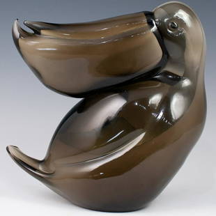 Licio Zanetti Murano Glass Pelican: DESCRIPTION: A murano glass sculpture by Licio Zanetti features a pelican infused with a cream base and smokey gray hues. Signed along the bottom "Licio Zanetti"Ã‚ CIRCA: Late 20th Ct.Ã‚