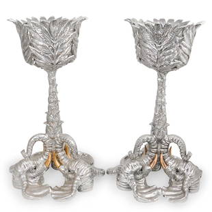 Pair Of Arthur Court Elephant Pedestal Planters: DESCRIPTION: A Pair of Figural Elephant planters/ice buckets by designer Arthur Court composed of casted aluminum. Each planter features a pedestal decorated with leaf branches and tripod elephant