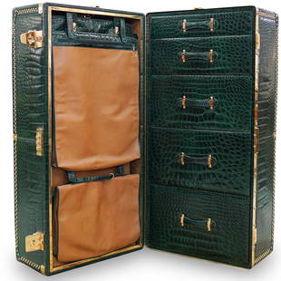 Rare Gucci Traveling Trunk: DESCRIPTION: A rare, elegant, hand-crafted crocodile skin trunk is one of only two produced in the world. Commissioned by Gucci for their flagship store in South Florida. The trunk is a dark green