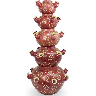 Neiman Marcus Ceramic Imported Planter: DESCRIPTION: An Italian Majolica stackable planter glazed in pink and green with tulip form spouts. The underside of each planter is marked "Neiman Marcus Italy"CIRCA: 20th/21st CenturyORIGIN: