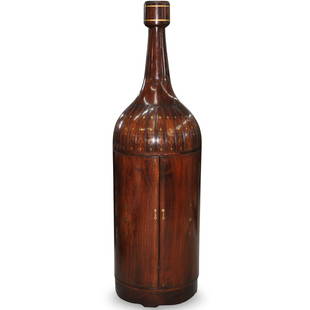 Monumental Mahogany Bottle Shaped Liquor Cabinet: DESCRIPTION: A monumental mahogany wooden bottle shaped liquor cabinet. Features delicate floral brass and copper inlays. The interior shelves for storing bottles and stemware.Ã‚ CIRCA: Mid 20th