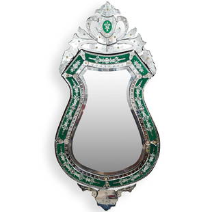 Venetian Style Etched Glass Wall Mirror: DESCRIPTION: A Venetian glass style Contemporary wall mirror, features stylized foliate crest, green glass frame with floral motifs and beveled glass mirror.CIRCA: 20th CenturyORIGIN: