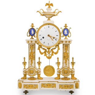 Louis XVI Gilt Bronze and Mounted Marble Portico Clock: DESCRIPTION: A Louis XVI gilt bronze, mounted marble portico clocks, with pendulum, the enamel dial signed "Rouviere A Paris"CIRCA: 19th CenturyORIGIN: FranceDIMENSIONS: H. 21" x W. 13.5" x D.