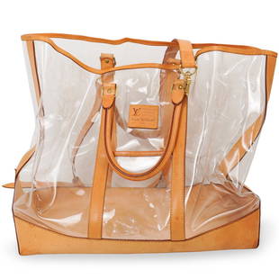 Isaac Mizrahi x Louis Vuitton Clear Vinyl Weekender: DESCRIPTION: In clear vinyl and trimmed with natural Vachetta leather. Includes an optional and adjustable shoulder strap for versatile carry. Labeled on the exterior.CIRCA: 1996ORIGIN:
