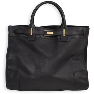 Gucci Black Leather Tote Bag: DESCRIPTION: Gucci black leather tote bag with brass hardware, opens to reveal fabric lining with one side zipper pocket. Includes dust bag.CIRCA: 20th CenturyORIGIN: ItalyDIMENSIONS: H.16" x W.