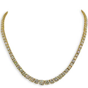 18k Gold and Diamond Tennis Necklace: DESCRIPTION: An 18k yellow gold tennis necklace fitted with 96 White VS1 diamonds along the strand graduating from .75 cts to .10 cts, further completed with a cluster of diamonds on the clasp in an