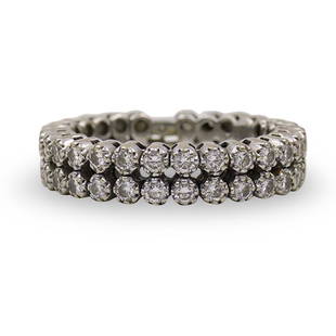 Vintage 18k Gold and Diamond Mechanical Ring: DESCRIPTION: A Vintage 18k white gold ring with adjustable band, decorated with two rows of pointer diamonds amounting to a total of approx. .54cts, marked along the interior of the ring "18k Obi".