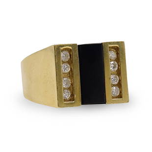 14k Gold, Diamond and Onyx Ring: DESCRIPTION: A 14k yellow gold ring decorated along the center with a Onyx stone strip, flanked on either sides by strips of .02 ct diamonds amounting approx. to a total of .16cts. Marked along the