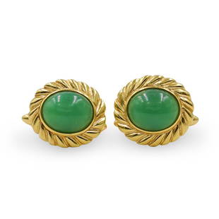 Pair Of 18k Gold and Jade Cufflinks: DESCRIPTION: A pair of 18k yellow gold cufflinks fitted with apple green jade cabochones, marked along the side "750". Total Weight: 13.1 Grams (8.4 dwt)CIRCA: 20th Cent.ORIGIN: