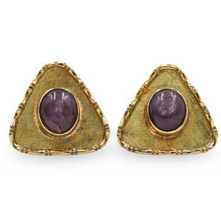 18k Gold and Star Ruby Cufflinks: DESCRIPTION: A pair of 18k yellow gold cufflinks centered with Star Ruby cabochones, marked "18k". Total Weight: 4.6 dwtCIRCA: 20th Cent.ORIGIN: ContinentalDIMENSIONS: W: .5"CONDITION: Great
