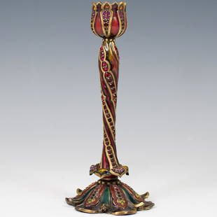 Jay Strongwater Candlestick: DESCRIPTION: Jay Strongwater bronze and enamel candlestick with synthetic stones marked traditionally on the bottom. CIRCA: 20th century ORIGIN: U.S,A DIMENSIONS: 7'' tall and 3'' wide at the bassÃ��