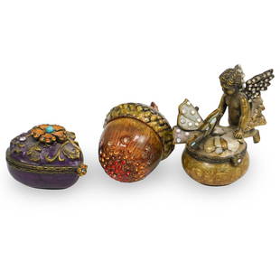 (3 pc) Jay Strongwater Pill Boxes: DESCRIPTION: Three Jay Strongwater pill boxes. The first one is a bronze and enamel acorn with synthetic stones it is marked traditional on the inside top lid. The second one is a bronze and enamel