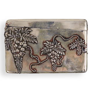Japanese Silver Meiji Box: DESCRIPTION: A Japanese meiji period silver card case, with high relief decoration with grapes and vines on the front and reverse. Hallmarked with Japanese character symbol. Weight: 76.1 grams.CIRCA: