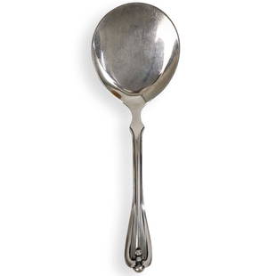 Cohr Danish Sterling Silver Spoon: DESCRIPTION: A Danish sterling serving spoon, by Cohr, of modernistic design with a wide bowl, hallmarked on handle. Weight: 84 grams. CIRCA: 20th Century ORIGIN: Denmark DIMENSIONS: L. 7.75" CONDITIO