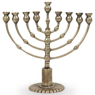 Sterling Silver Menorah: DESCRIPTION: A 925 Weighted Sterling silver menorah, marked on the underside, "Sterling 925" Weight: 438 grams.CIRCA: 20th CenturyORIGIN: ContinentalDIMENSIONS: H. 7.75" x W. 7.75"CONDITION: Great